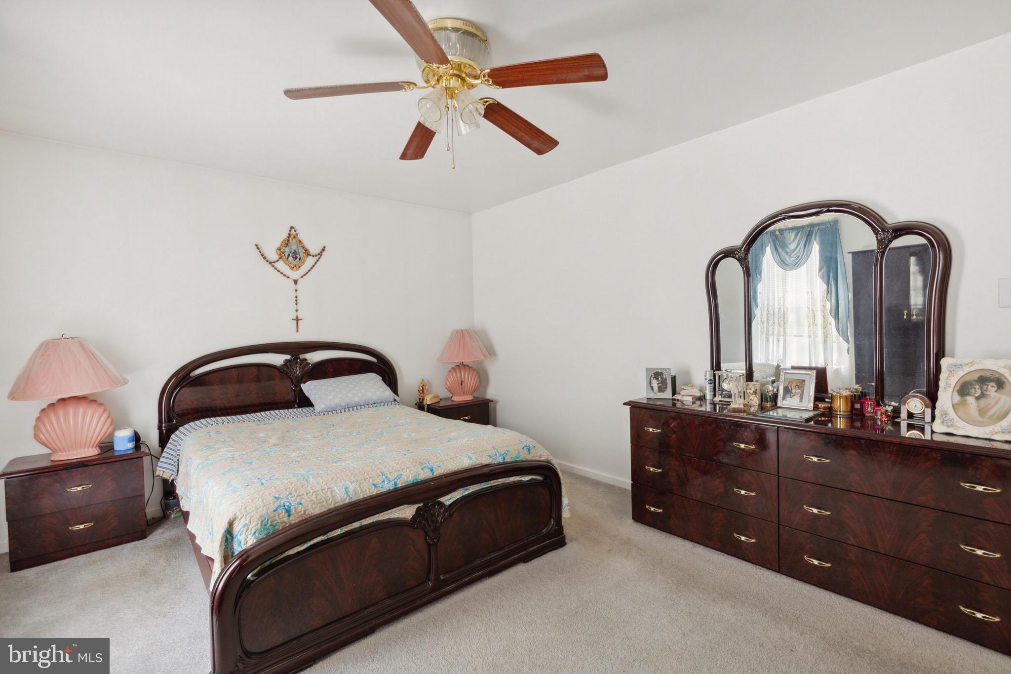 38 Cherry Tree Court Spring City, PA 19475 - Photo 22 of 35 a bedroom with a bed and a dresser