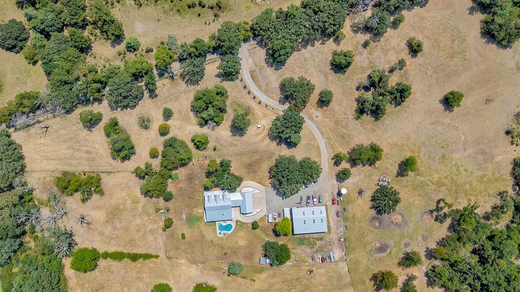 337 County Road 3535 Saltillo, TX 75478 - Photo 31 of 36 an aerial view of a house with a garden