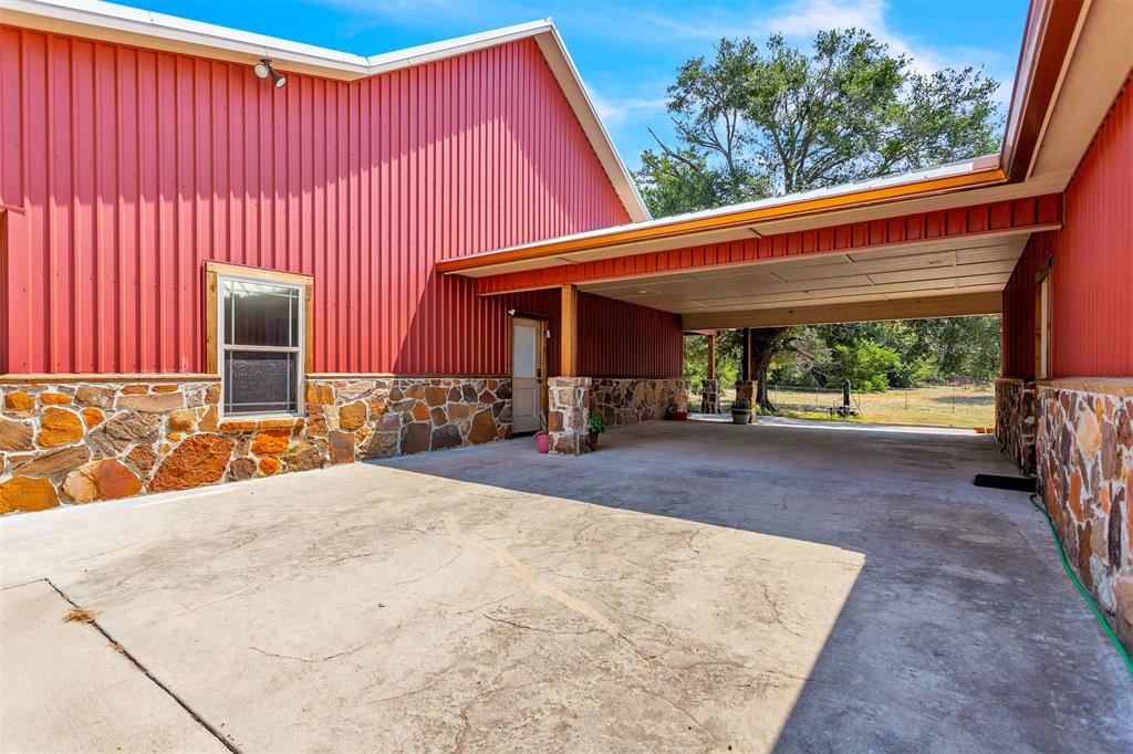 337 County Road 3535 Saltillo, TX 75478 - Photo 5 of 36 an outdoor view of house with patio