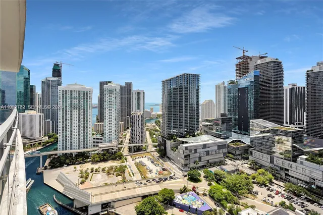 a view of a city with tall buildings