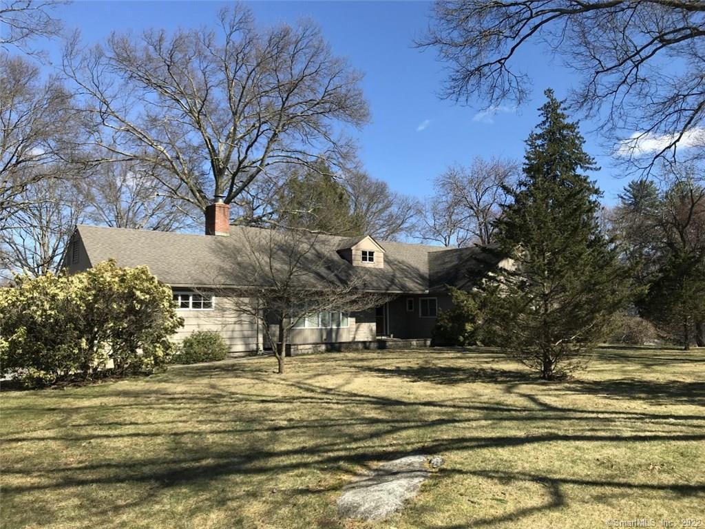 333 West Hill Road Stamford, CT 06902 - Photo 1 of 1 a view of swimming pool with outdoor seating and trees in the background