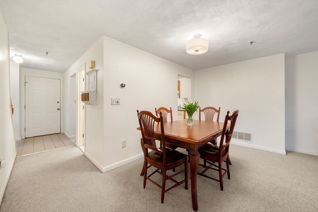 5 Oak Ridge Drive, Unit 7 Maynard, MA 01754 - Photo 7 of 20 a view of a dining room with furniture