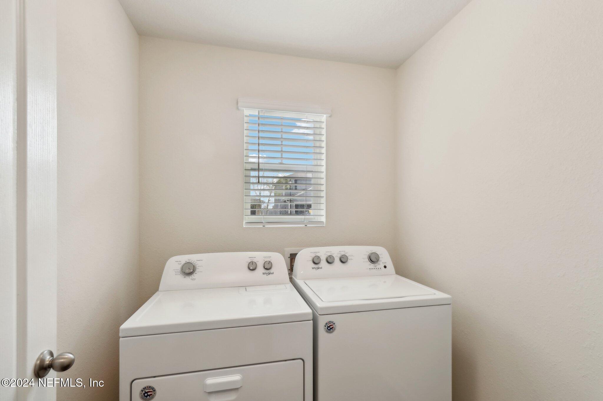 2535 Acorn Creek Road Green Cove Springs, FL 32043 - Photo 13 of 35 a utility room with dryer and washer