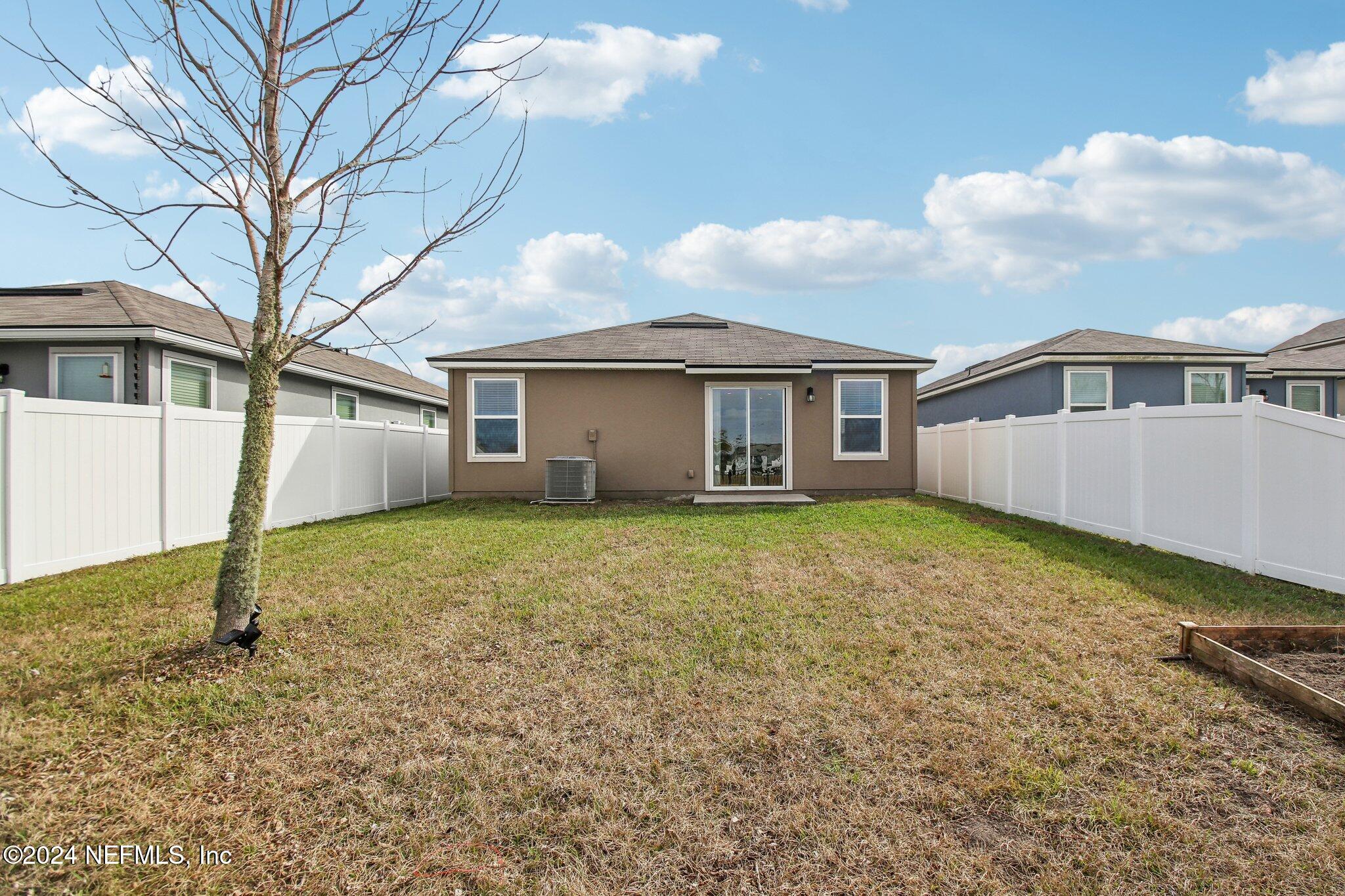 2535 Acorn Creek Road Green Cove Springs, FL 32043 - Photo 25 of 35 front view of a house with a yard