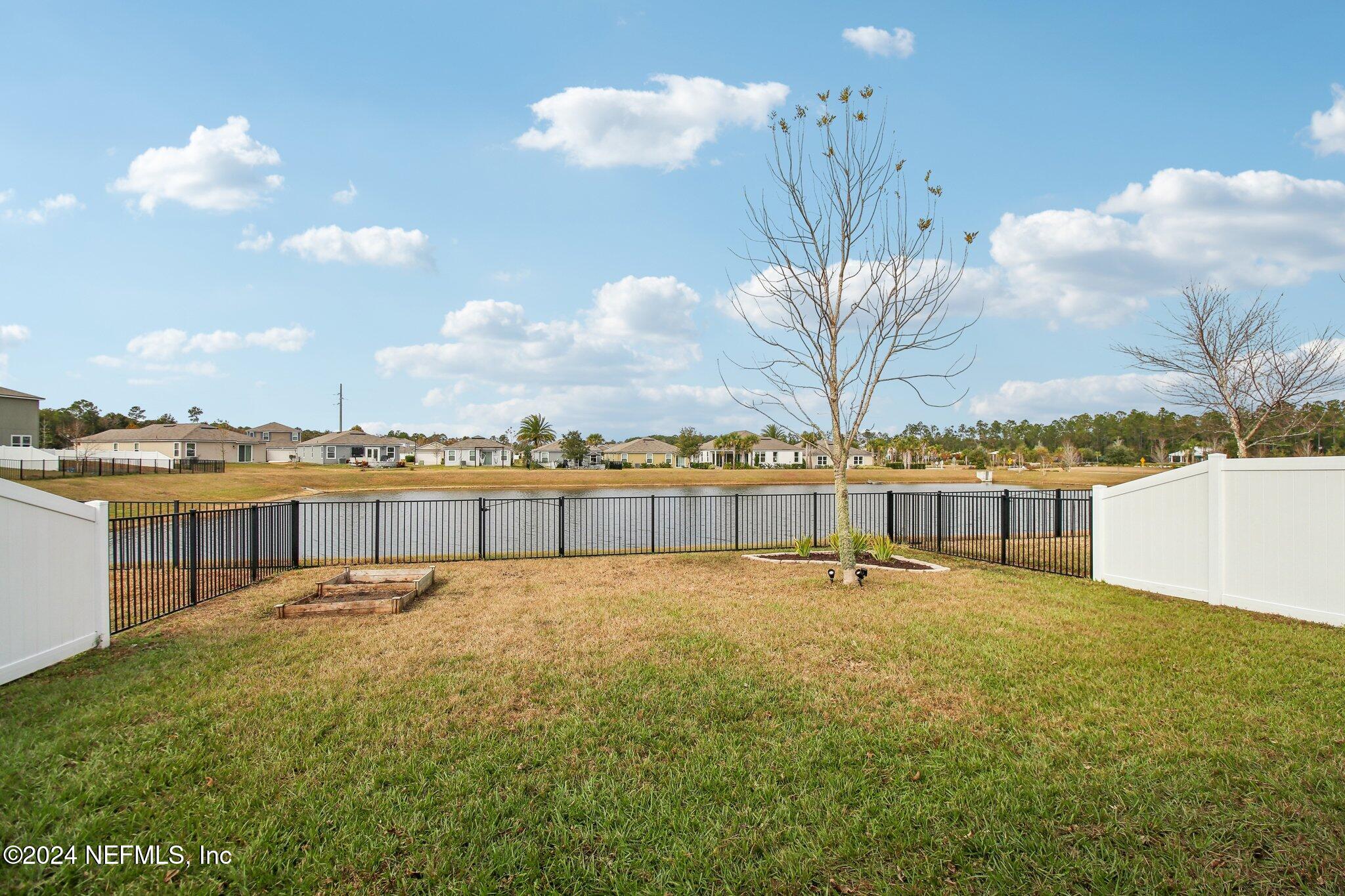 2535 Acorn Creek Road Green Cove Springs, FL 32043 - Photo 27 of 35 a view of a swimming pool and an outdoor space