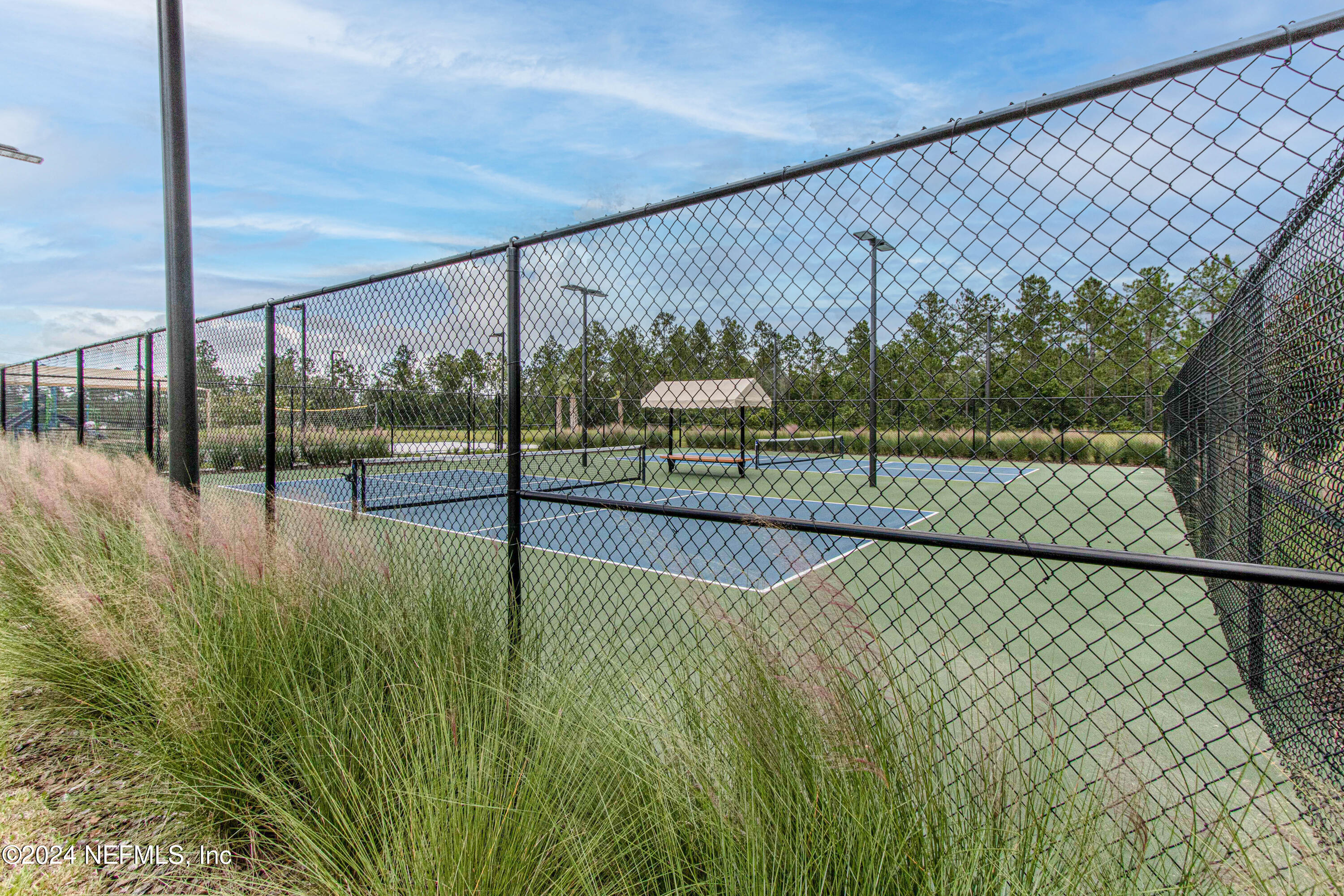 2535 Acorn Creek Road Green Cove Springs, FL 32043 - Photo 35 of 35 a view of a tennis court