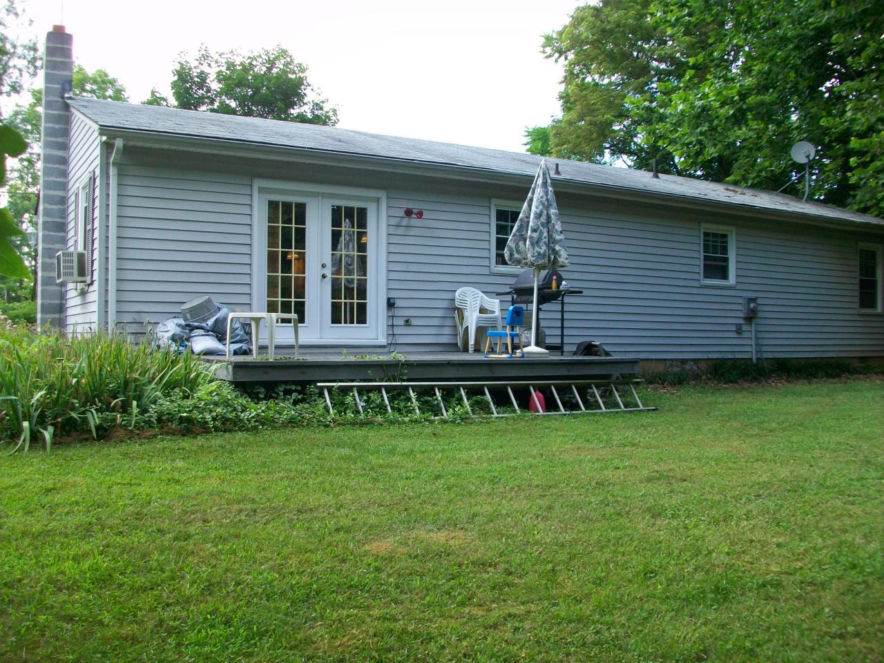 4336 Union Church Road Thaxton, VA 24174 - Photo 2 of 9 a view of a house with backyard and sitting area