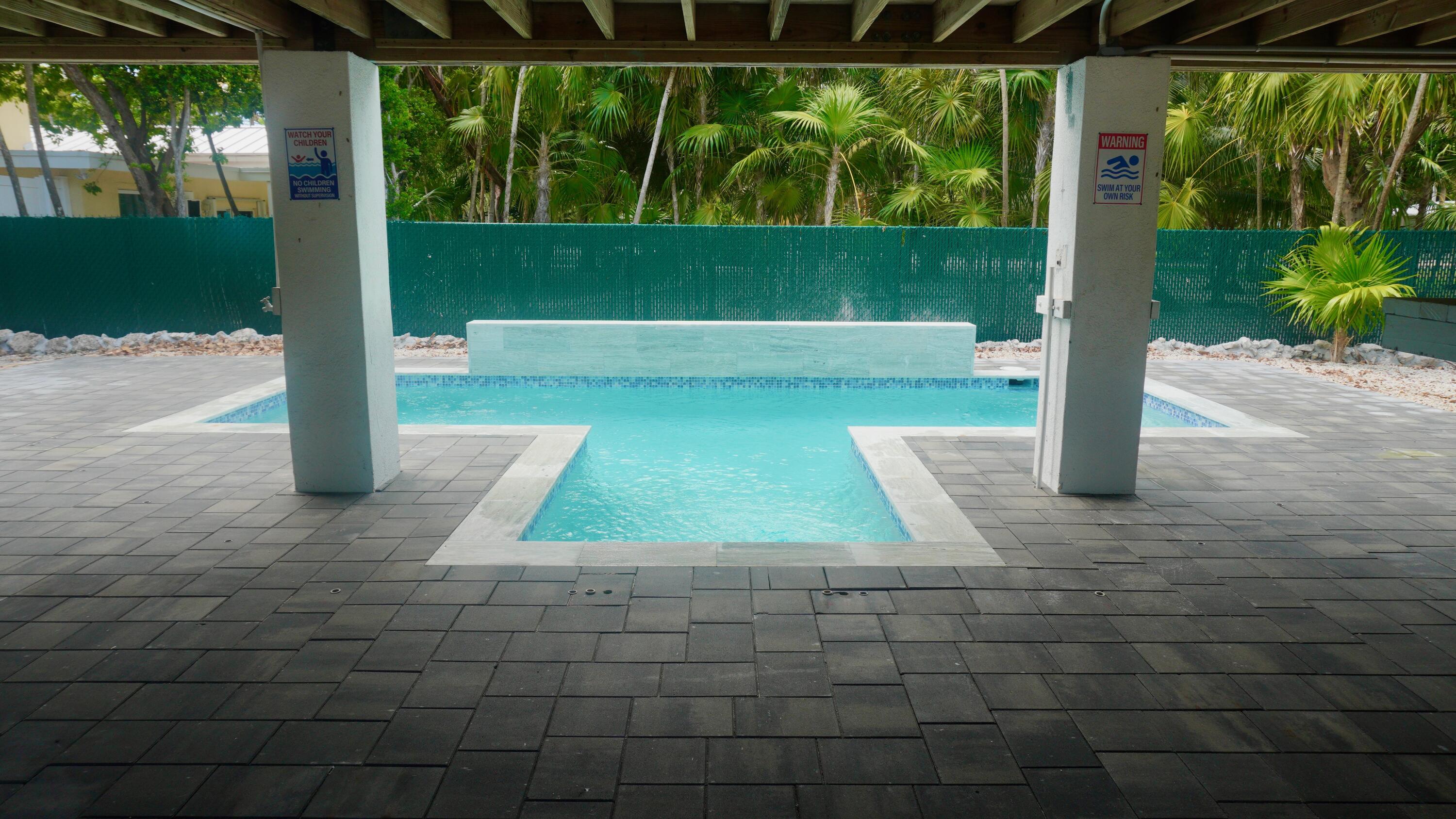 565 95th Street Marathon, FL 33050 - Photo 2 of 15 Pool & Waterfall