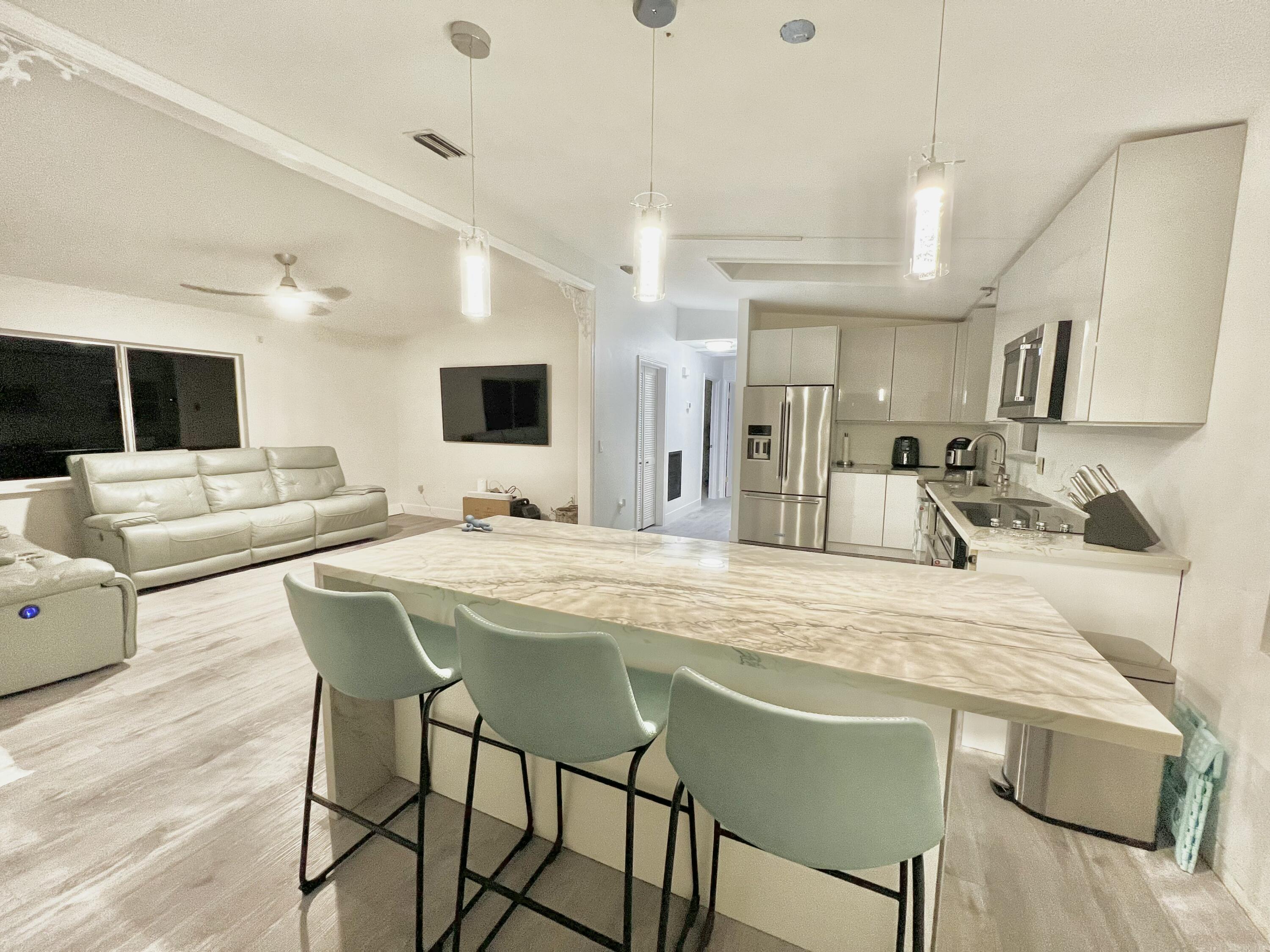 565 95th Street Marathon, FL 33050 - Photo 3 of 15 Kitchen & Living Room