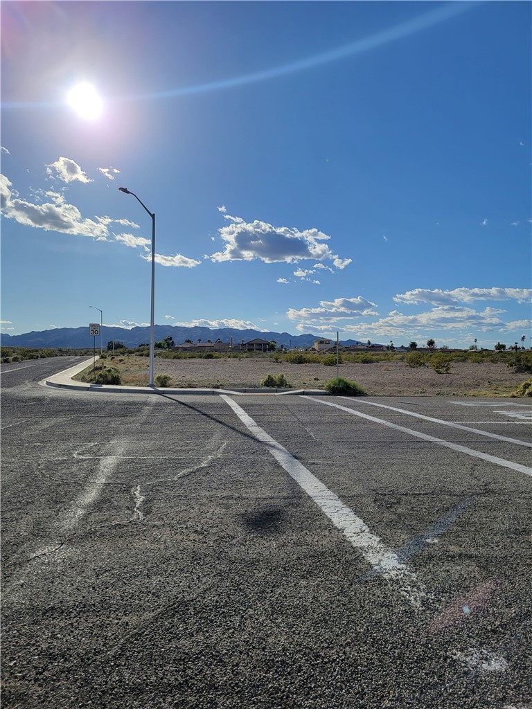 a view of an ocean & mountain