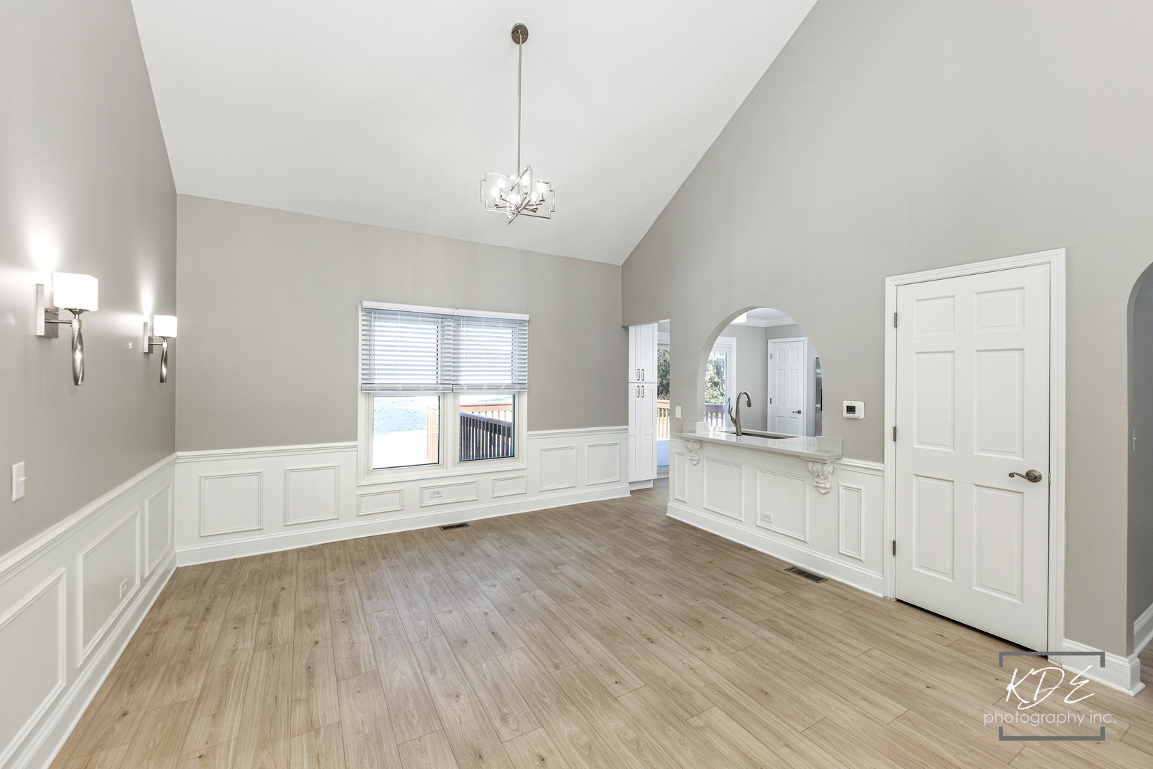 3027 Brossman Street Naperville, IL 60564 - Photo 6 of 42 a view of a bedroom with wooden floor and windows