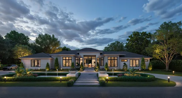 a front view of a house with garden