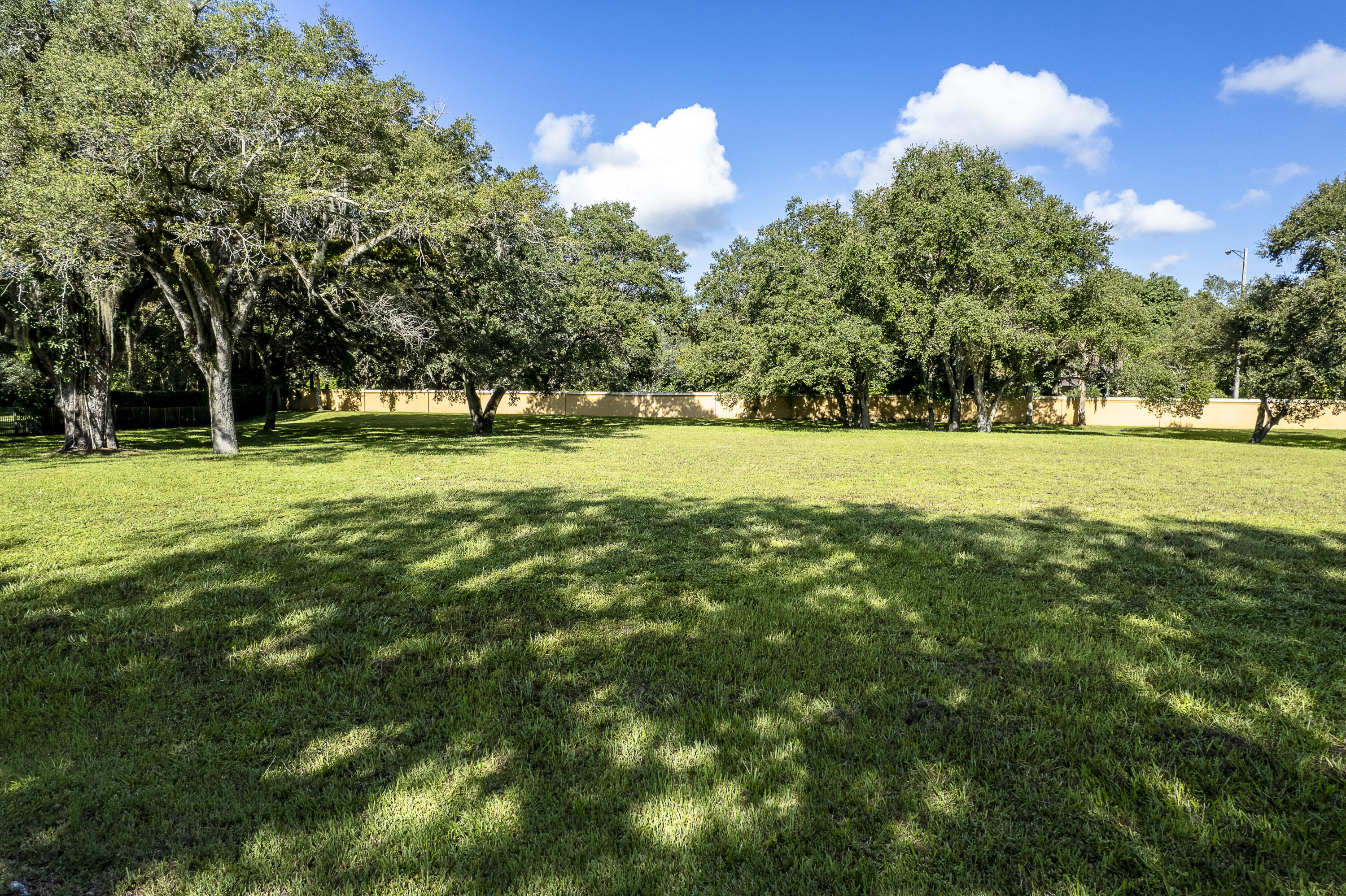 9900 Winding Rdg Lane Davie, FL 33324 - Photo 5 of 7 a view of field with trees in the background