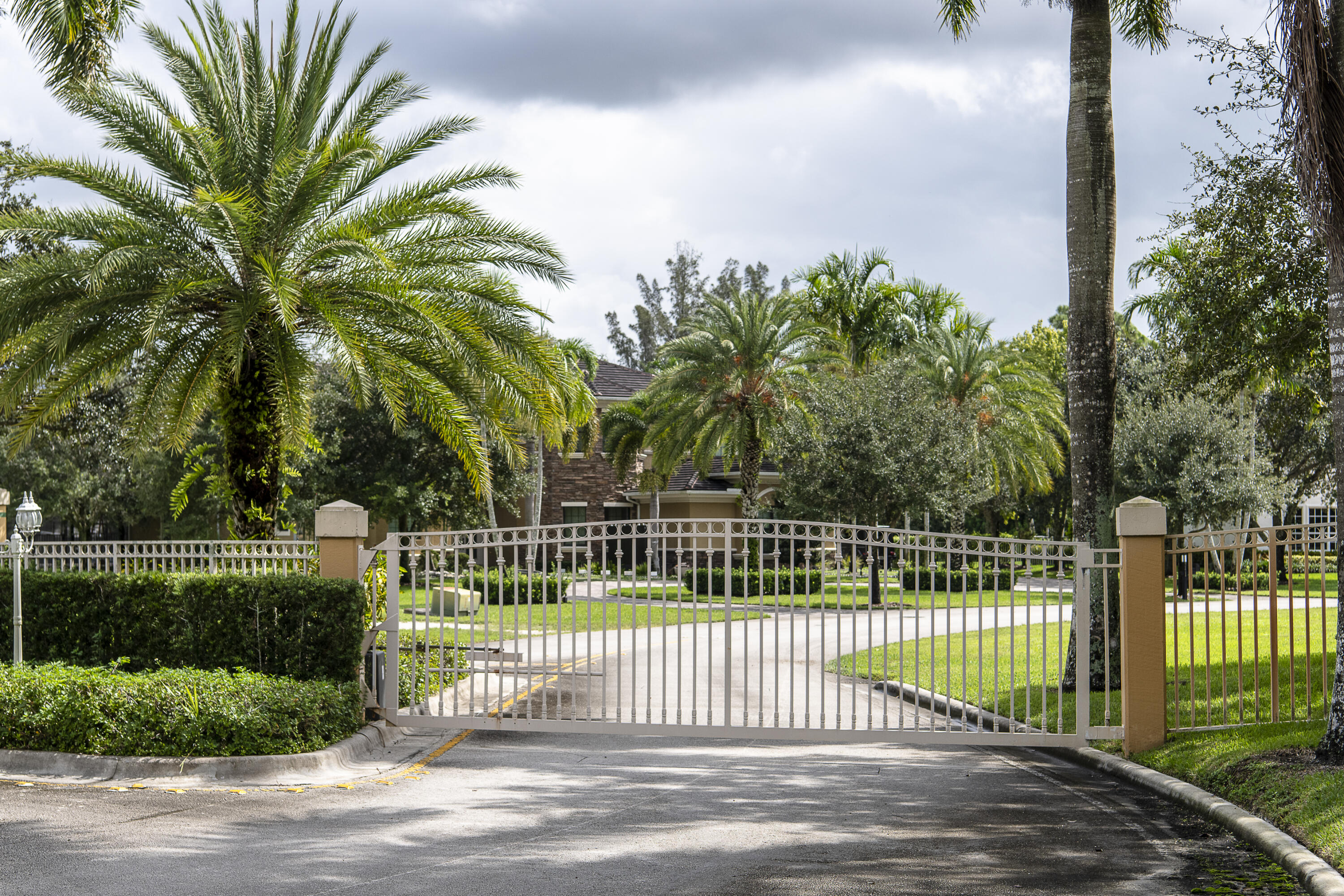 9900 Winding Rdg Lane Davie, FL 33324 - Photo 6 of 7 a view of a wrought iron fence