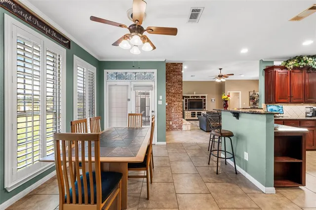 a bathroom with a toilet a sink and a mirror