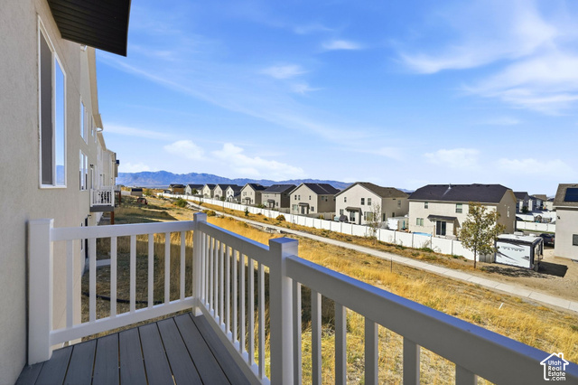 428 Quartz Road Tooele, UT 84074 - Photo 31 of 35 Private balcony with composite decking, white railing, and stucco exterior