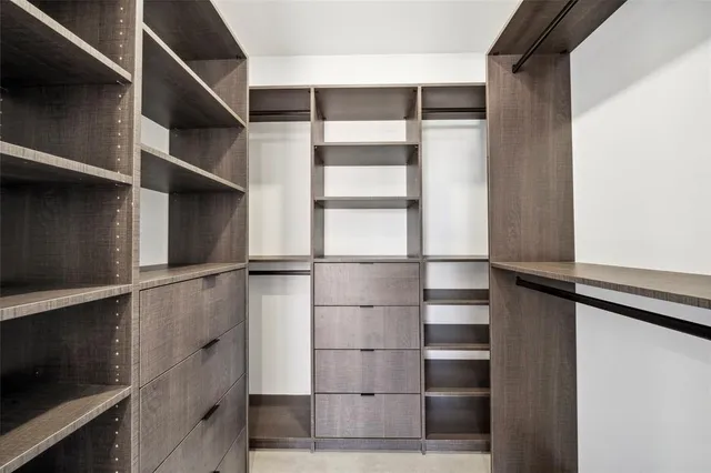 a view of an empty walk in closet