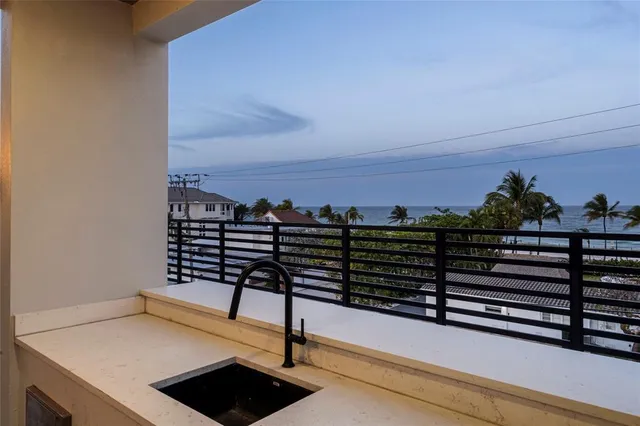 a view of a balcony with a chair