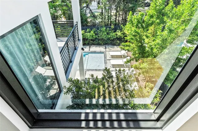 a view balcony a couple of potted plants