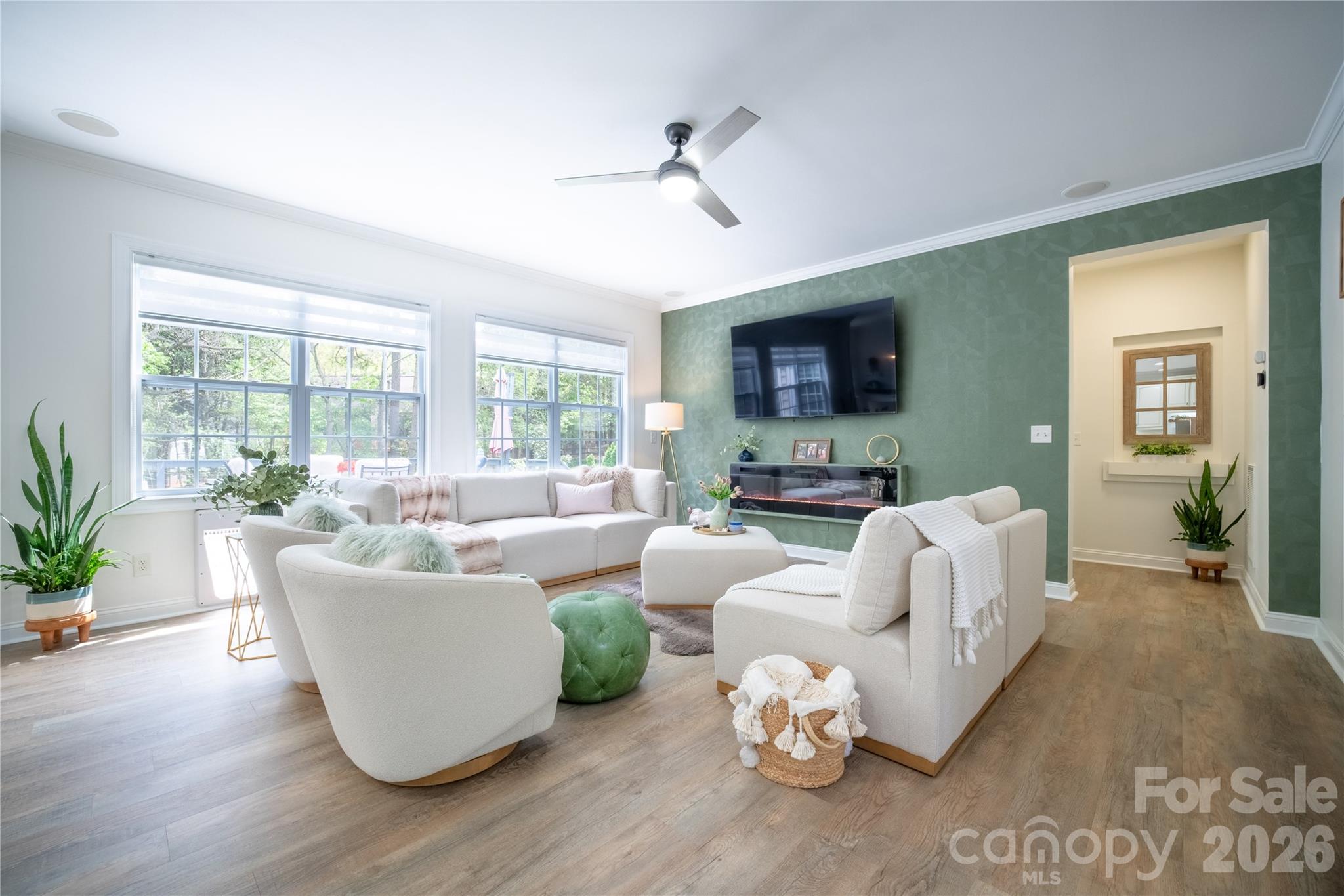 12058 Pelican Court Tega Cay, SC 29708 - Photo 11 of 43 a living room with furniture fireplace and a large window
