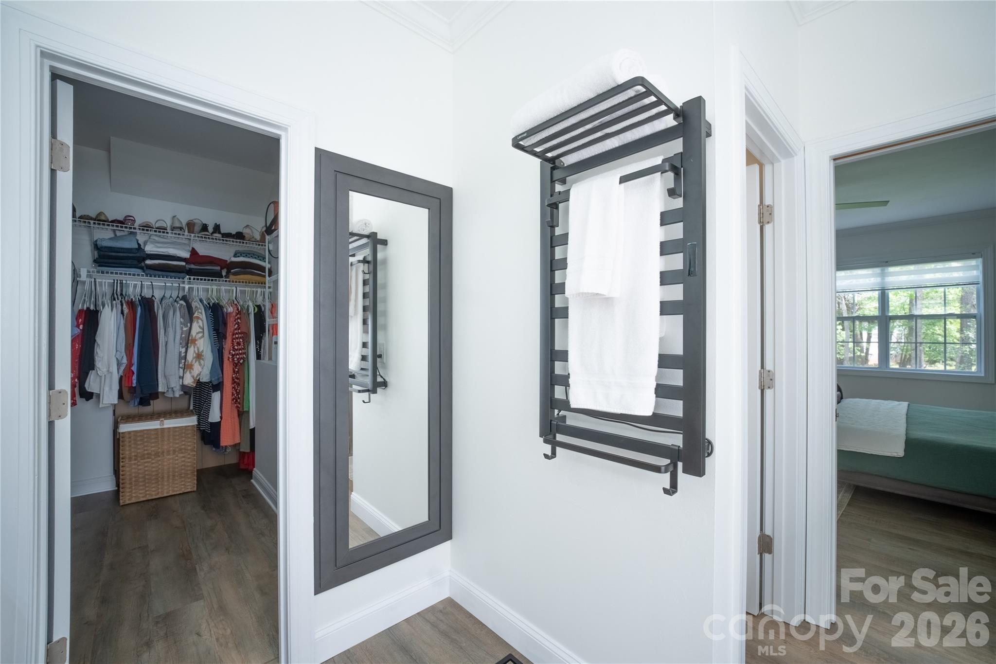 12058 Pelican Court Tega Cay, SC 29708 - Photo 16 of 43 a view of hallway with walk in closet and bedroom