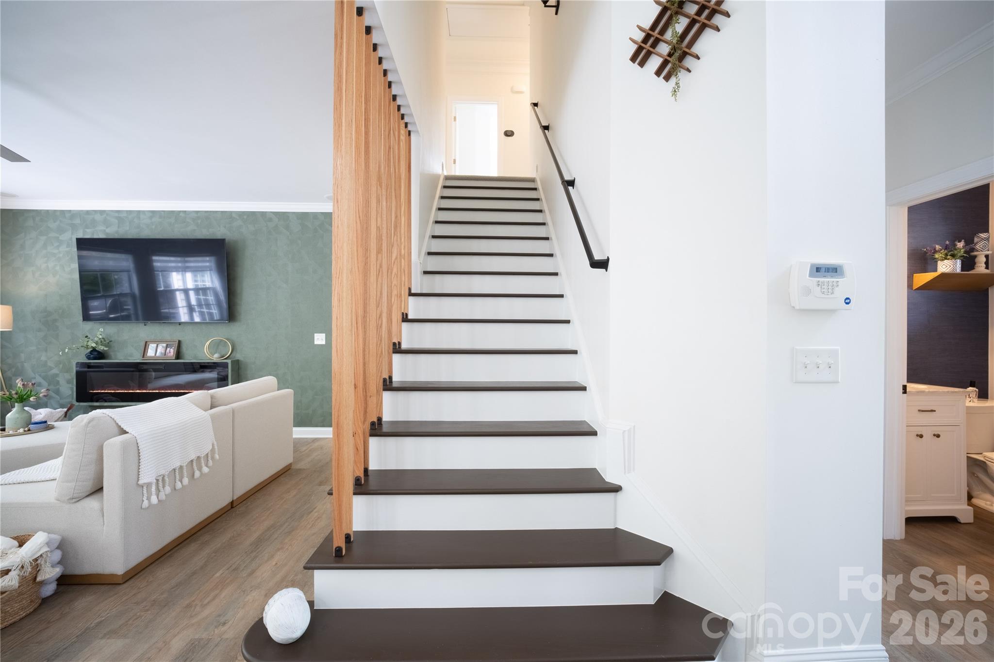 12058 Pelican Court Tega Cay, SC 29708 - Photo 17 of 43 a view of entryway and hall with wooden floor