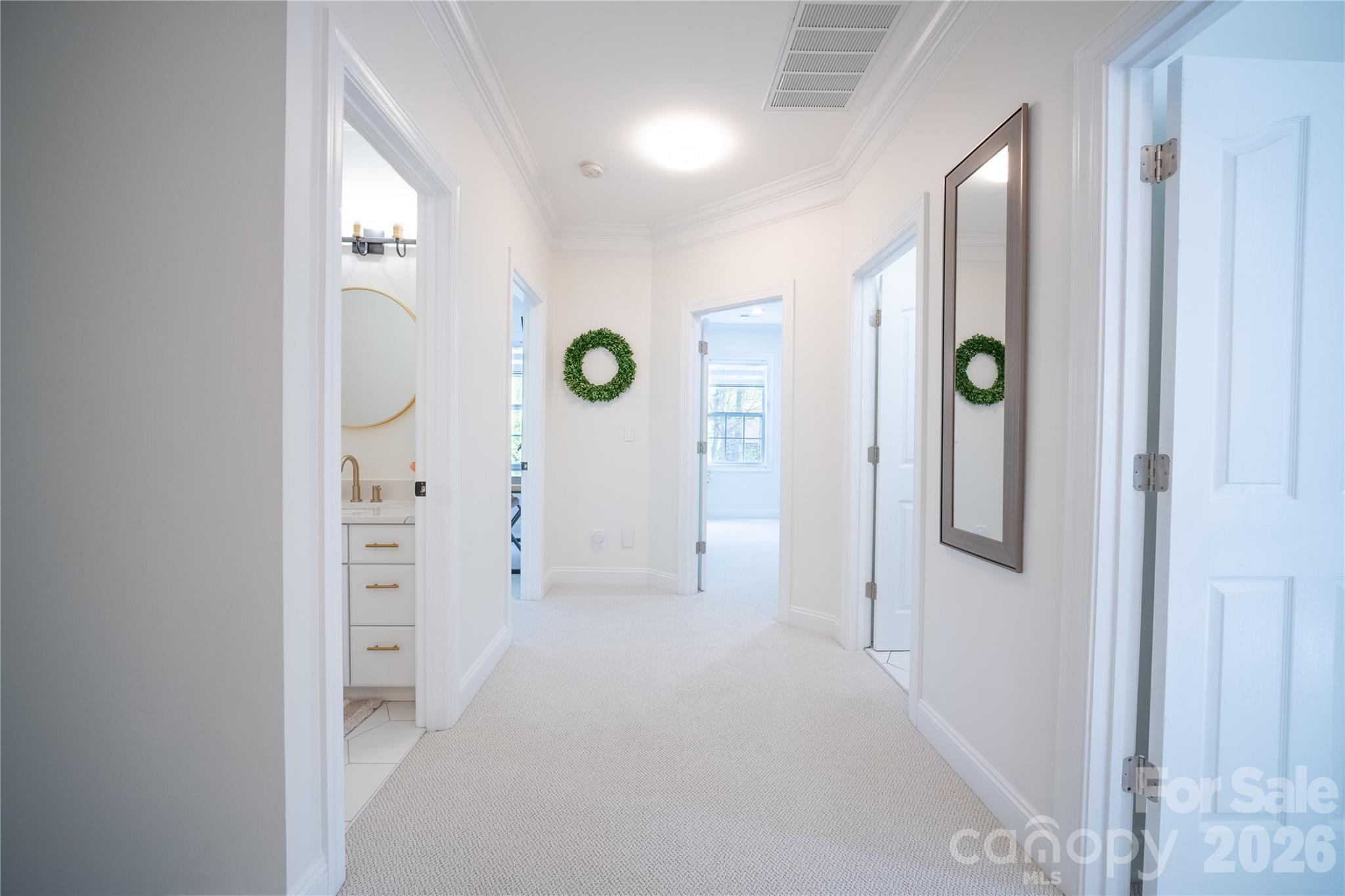 12058 Pelican Court Tega Cay, SC 29708 - Photo 18 of 43 view of a hallway with closet