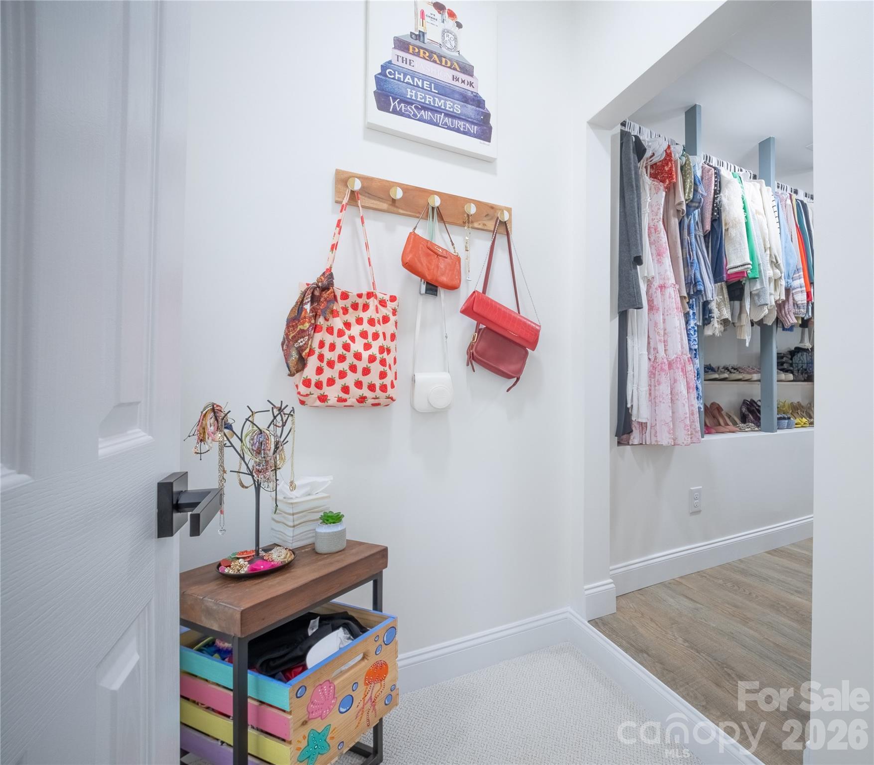 12058 Pelican Court Tega Cay, SC 29708 - Photo 22 of 43 a room with lots of white cabinet and a window
