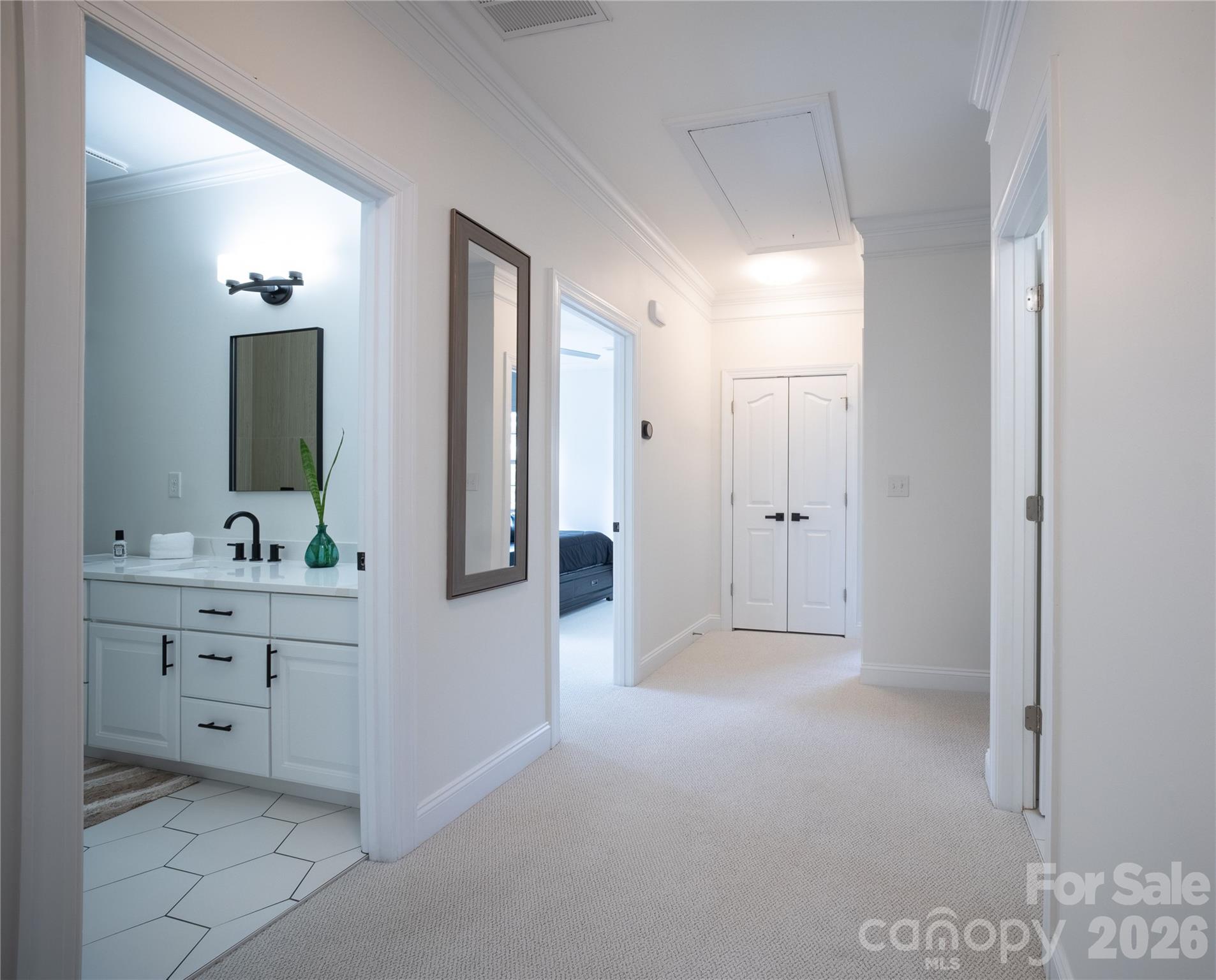 12058 Pelican Court Tega Cay, SC 29708 - Photo 24 of 43 a view of a bathroom with mirror