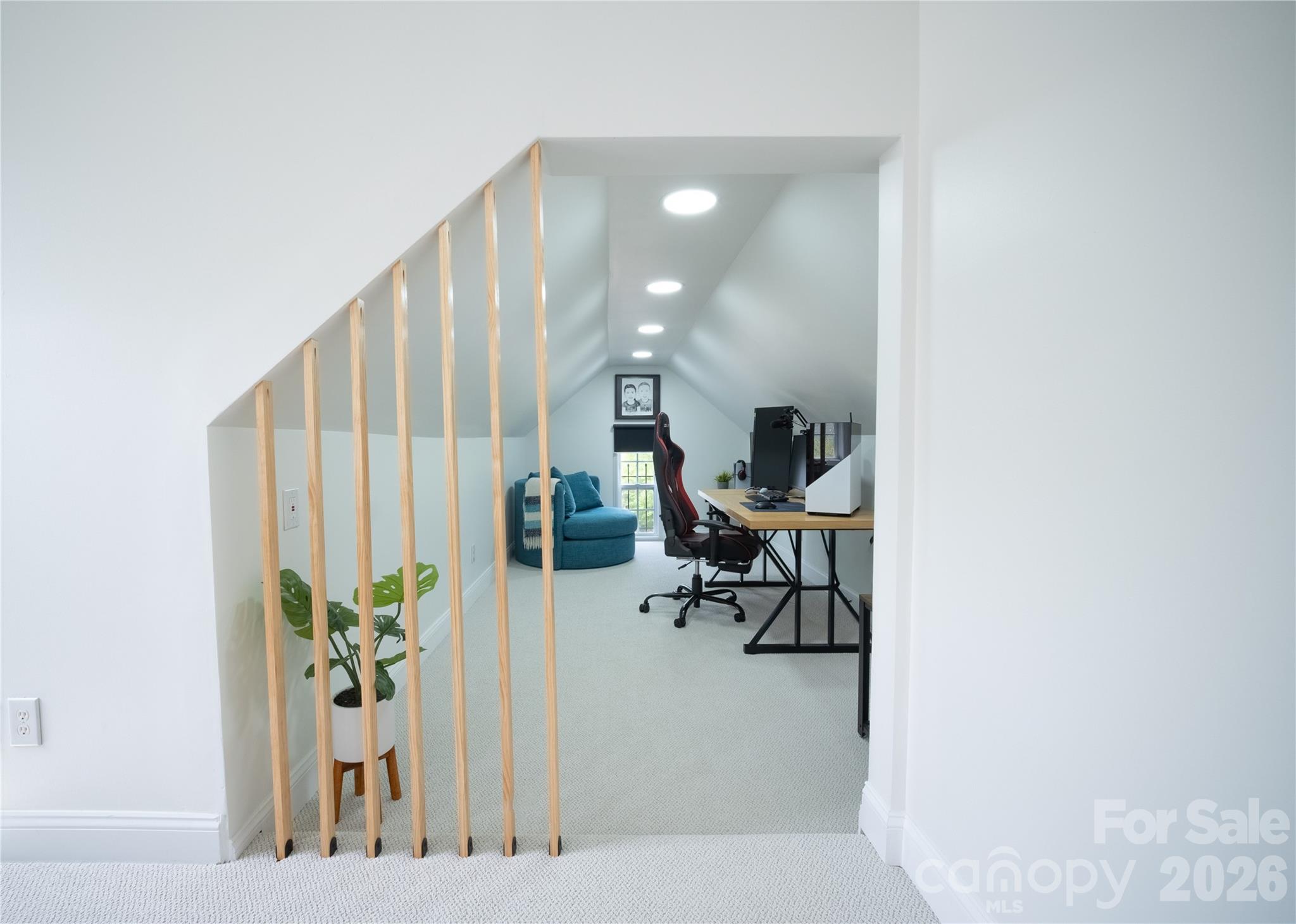 12058 Pelican Court Tega Cay, SC 29708 - Photo 28 of 43 a living room with furniture and a potted plant