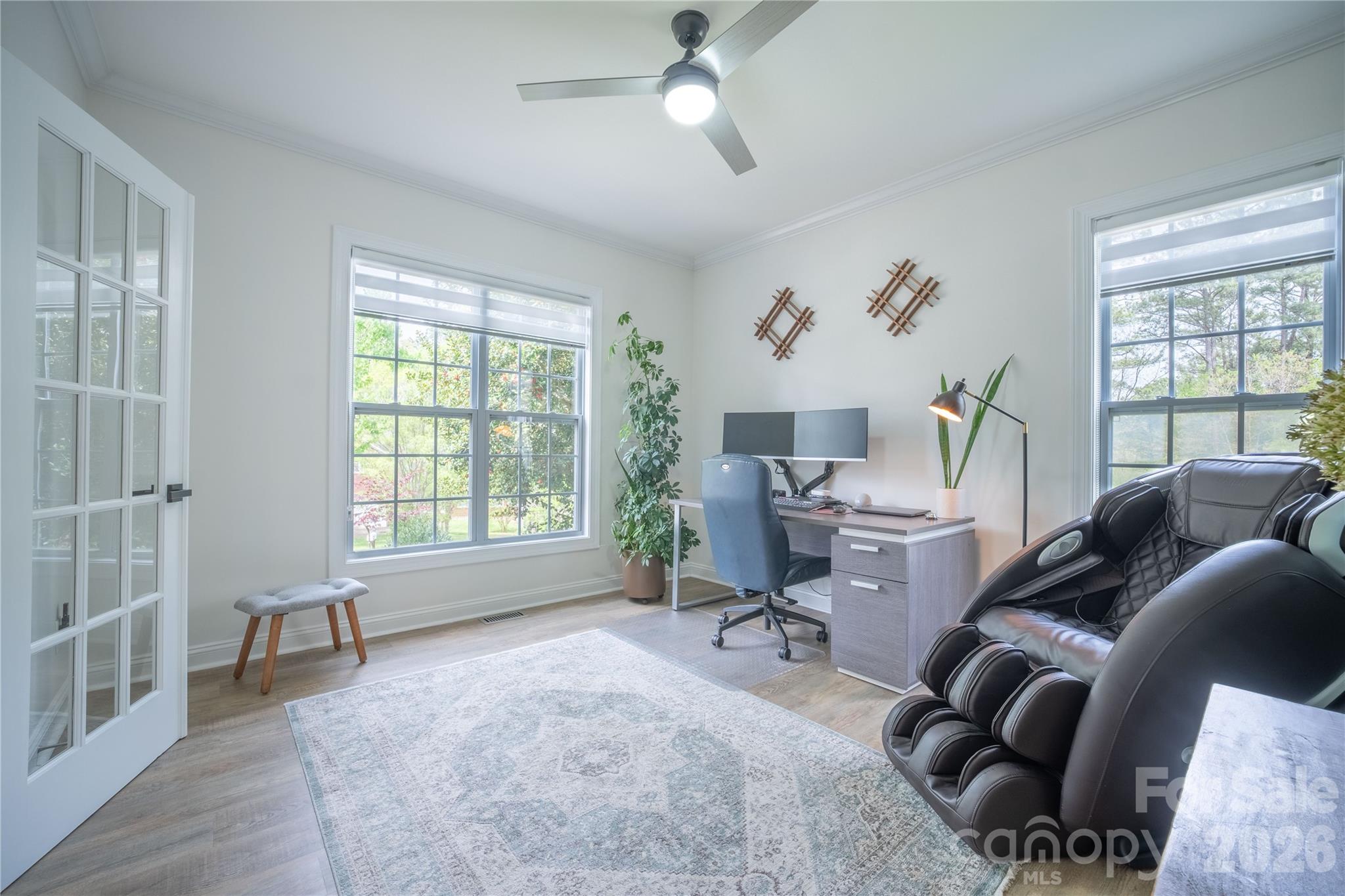12058 Pelican Court Tega Cay, SC 29708 - Photo 4 of 43 a living room with furniture and a window