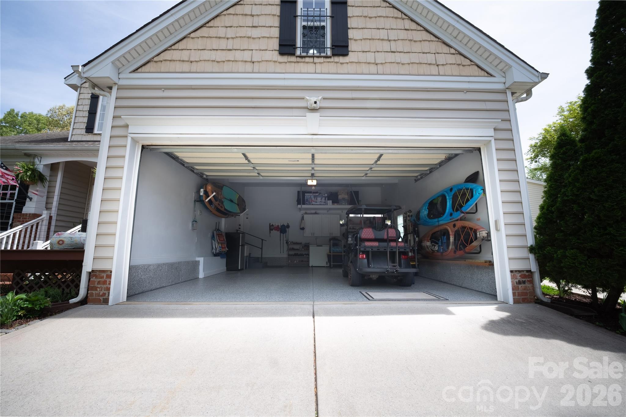 12058 Pelican Court Tega Cay, SC 29708 - Photo 41 of 43 a view of a garage door and furniture
