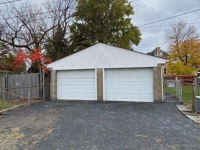 1028 Chartiers Avenue McKees Rocks, PA 15136 - Photo 2 of 25 Oversized 2-car garage with automatic openers and keypad entry.