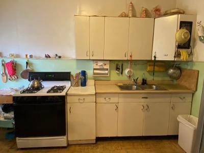 1028 Chartiers Avenue McKees Rocks, PA 15136 - Photo 11 of 25 Kitchen includes gas stove