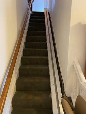 1028 Chartiers Avenue McKees Rocks, PA 15136 - Photo 16 of 25 Stairway and chairlift to second floor