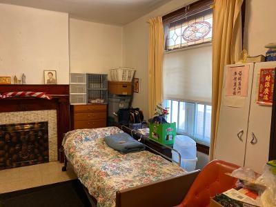 1028 Chartiers Avenue McKees Rocks, PA 15136 - Photo 6 of 25 Living room has original stained glass in window.
