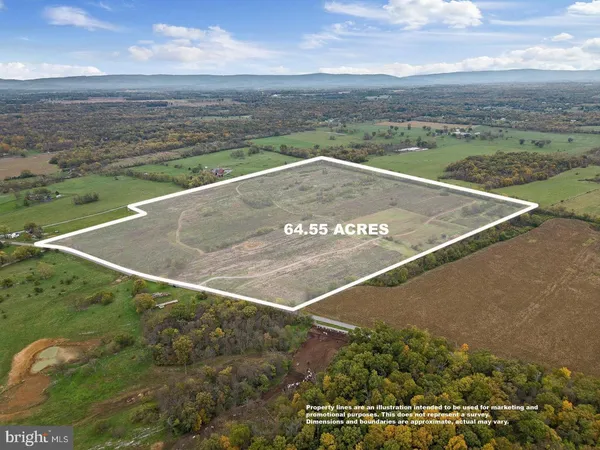a view of a lake with sunset