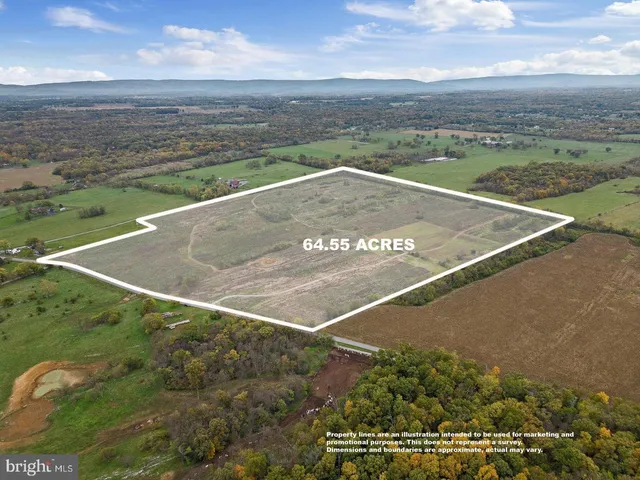 a view of a lake with sunset
