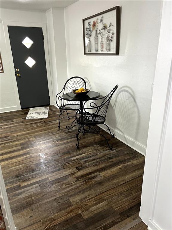 512 Lowell Street Vandergrift, PA 15690 - Photo 11 of 32 a view of a door and chair in wooden floor