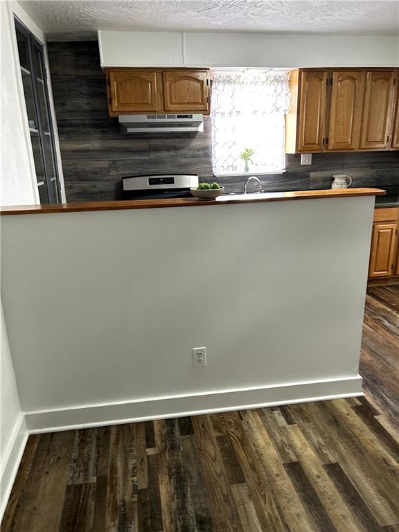 512 Lowell Street Vandergrift, PA 15690 - Photo 13 of 32 a view of a kitchen with wooden floor and a window