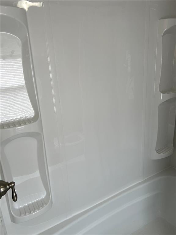512 Lowell Street Vandergrift, PA 15690 - Photo 26 of 32 a bathroom with a white toilet and tub