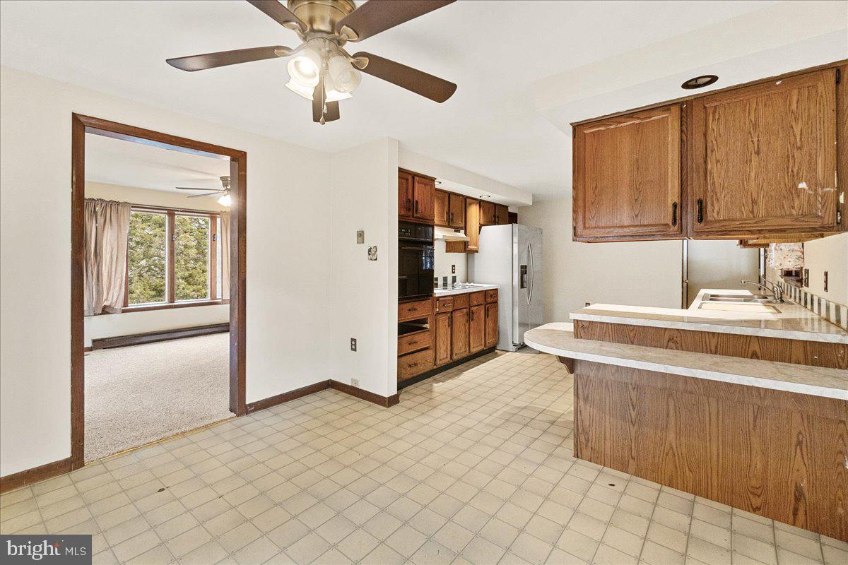 9101 Bessie Clemson Road Union Bridge, MD 21791 - Photo 10 of 55 a spacious bathroom with a double vanity sink mirror and