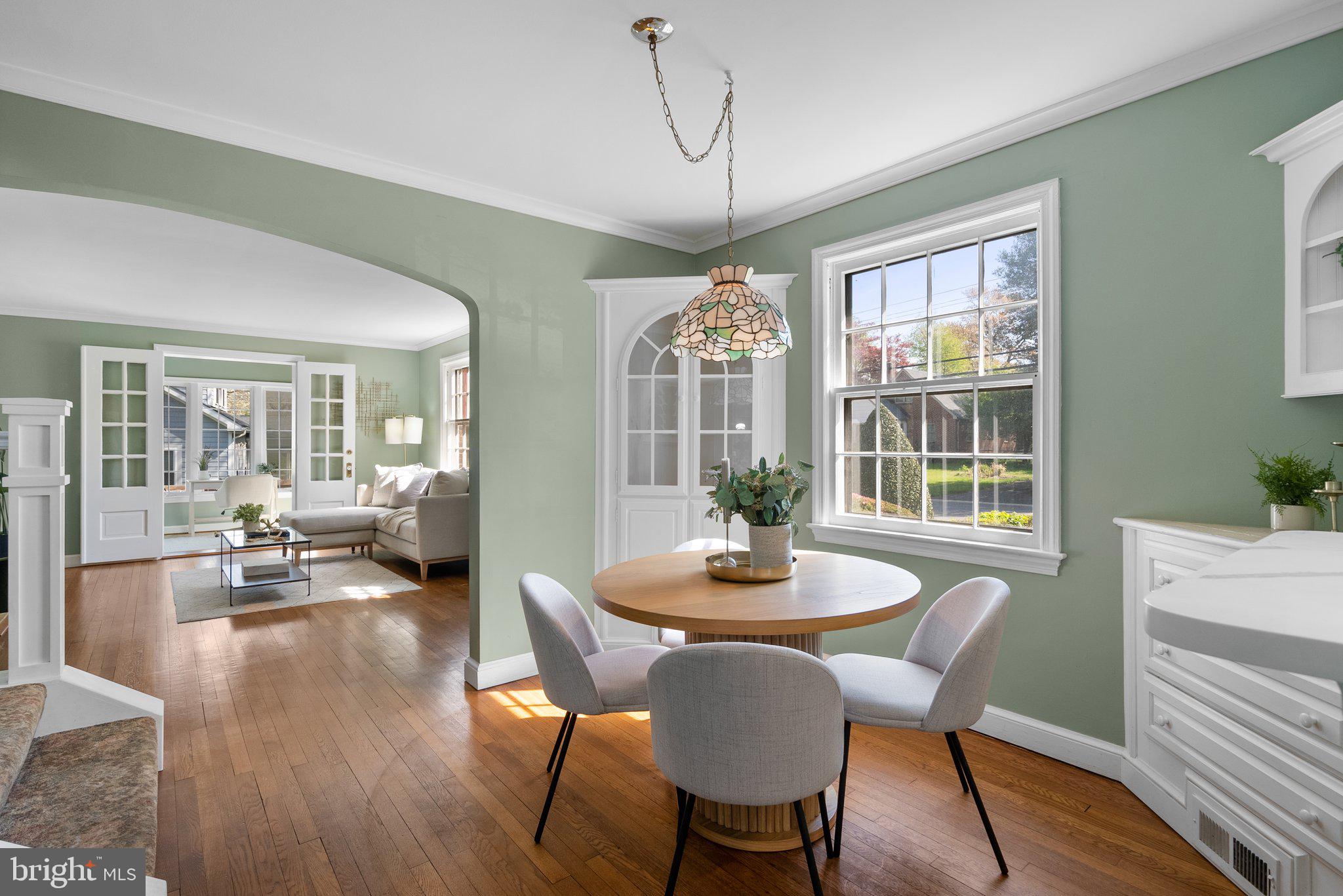 10210 Pierce Drive Silver Spring, MD 20901 - Photo 12 of 49 a view of a dining room with furniture window and wooden floor