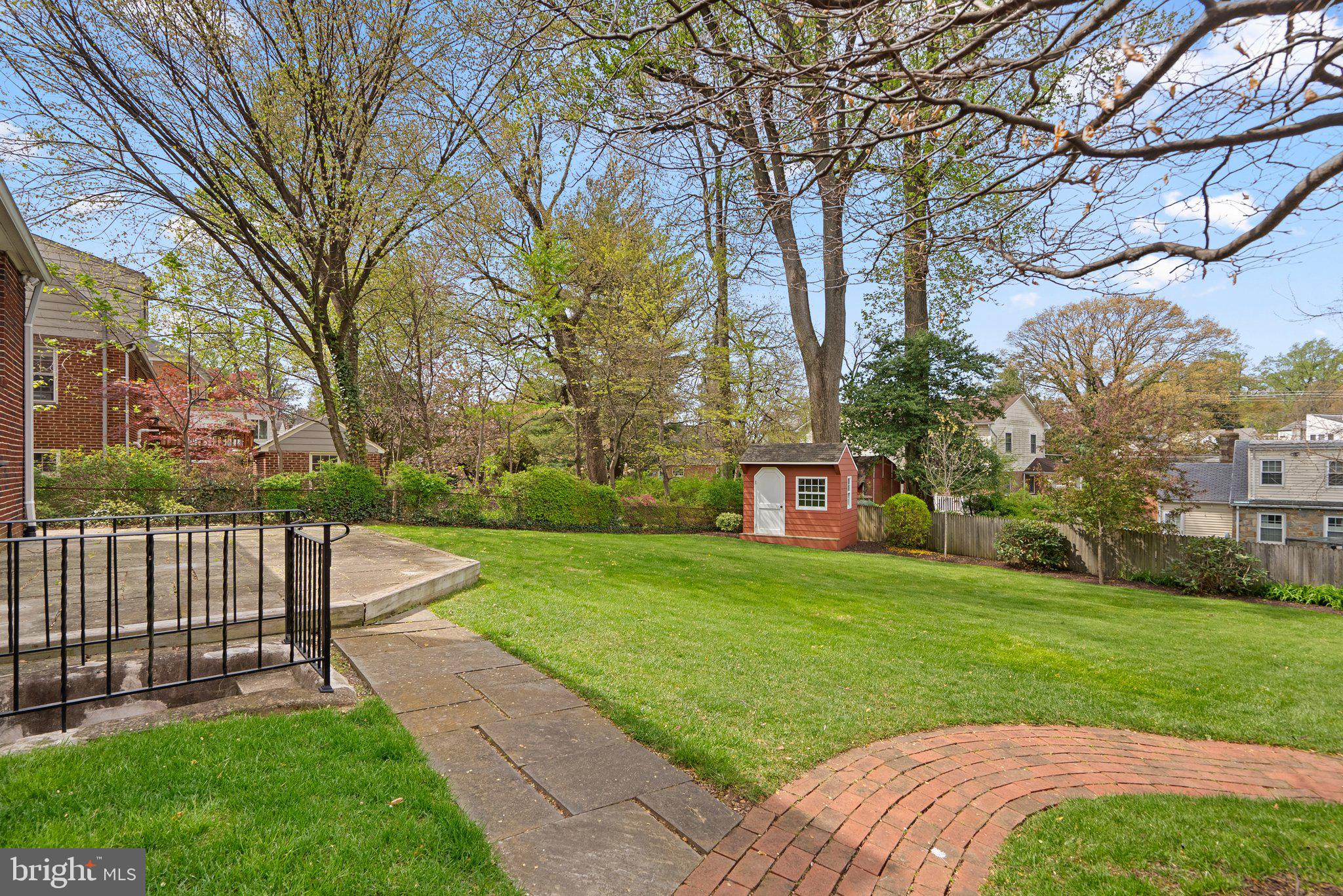 10210 Pierce Drive Silver Spring, MD 20901 - Photo 2 of 49 a view of a house with a yard and a tree