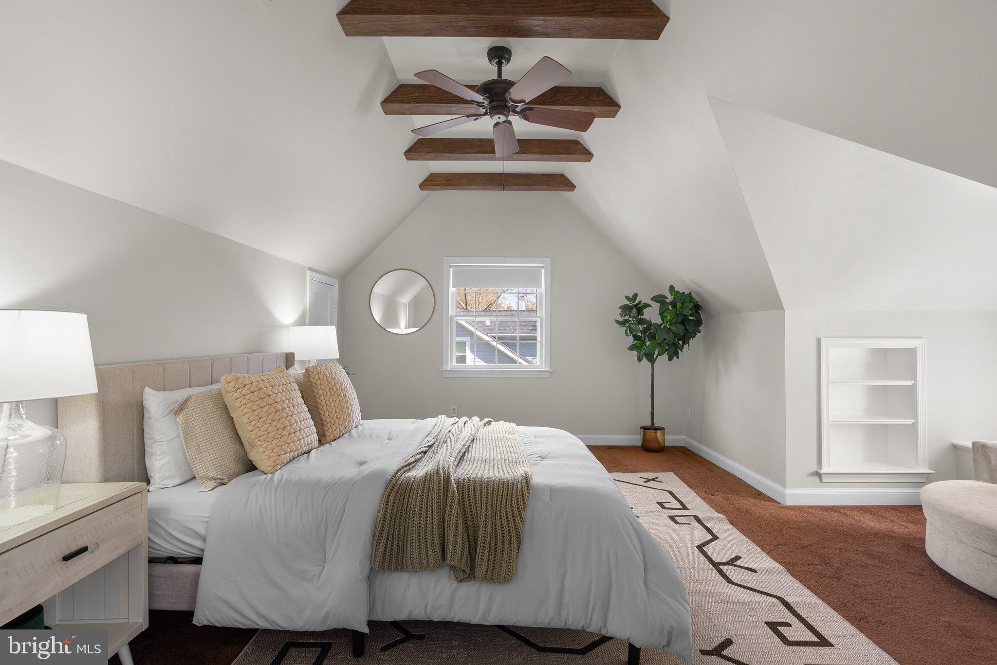 10210 Pierce Drive Silver Spring, MD 20901 - Photo 24 of 49 a bedroom with a bed and a potted plant