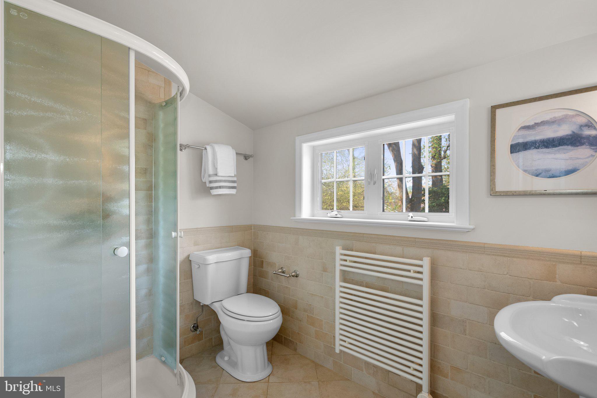 10210 Pierce Drive Silver Spring, MD 20901 - Photo 27 of 49 a bathroom with a toilet and a sink