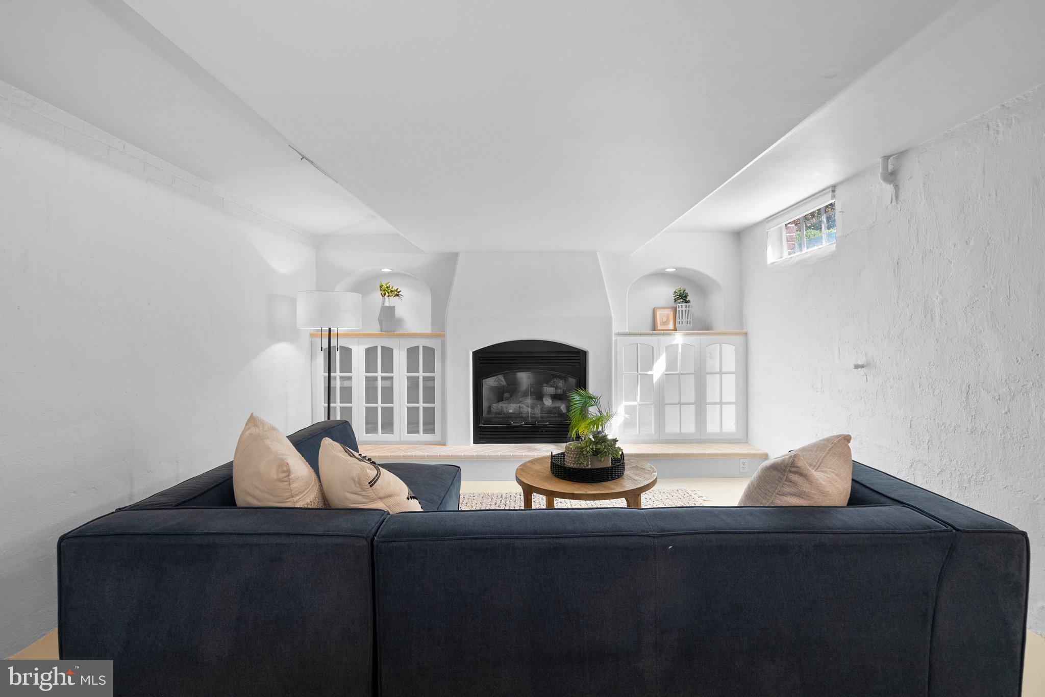 10210 Pierce Drive Silver Spring, MD 20901 - Photo 29 of 49 a living room with furniture and potted plant