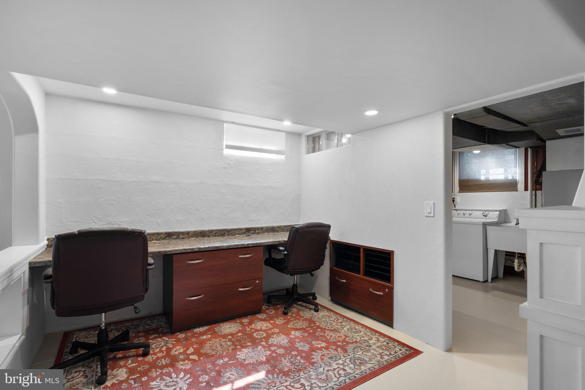 10210 Pierce Drive Silver Spring, MD 20901 - Photo 32 of 49 a room with furniture and a rug