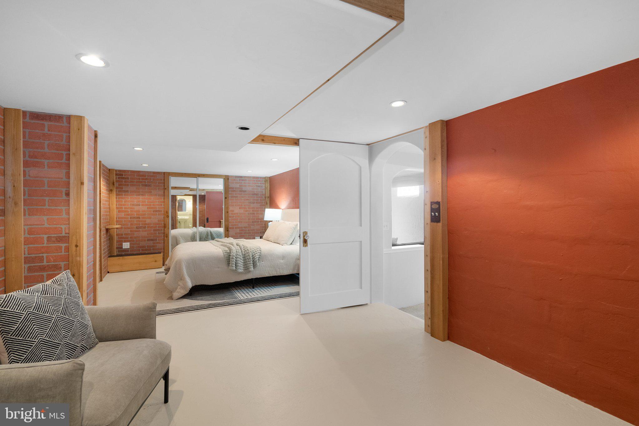 10210 Pierce Drive Silver Spring, MD 20901 - Photo 35 of 49 a bedroom with a bed couch and window