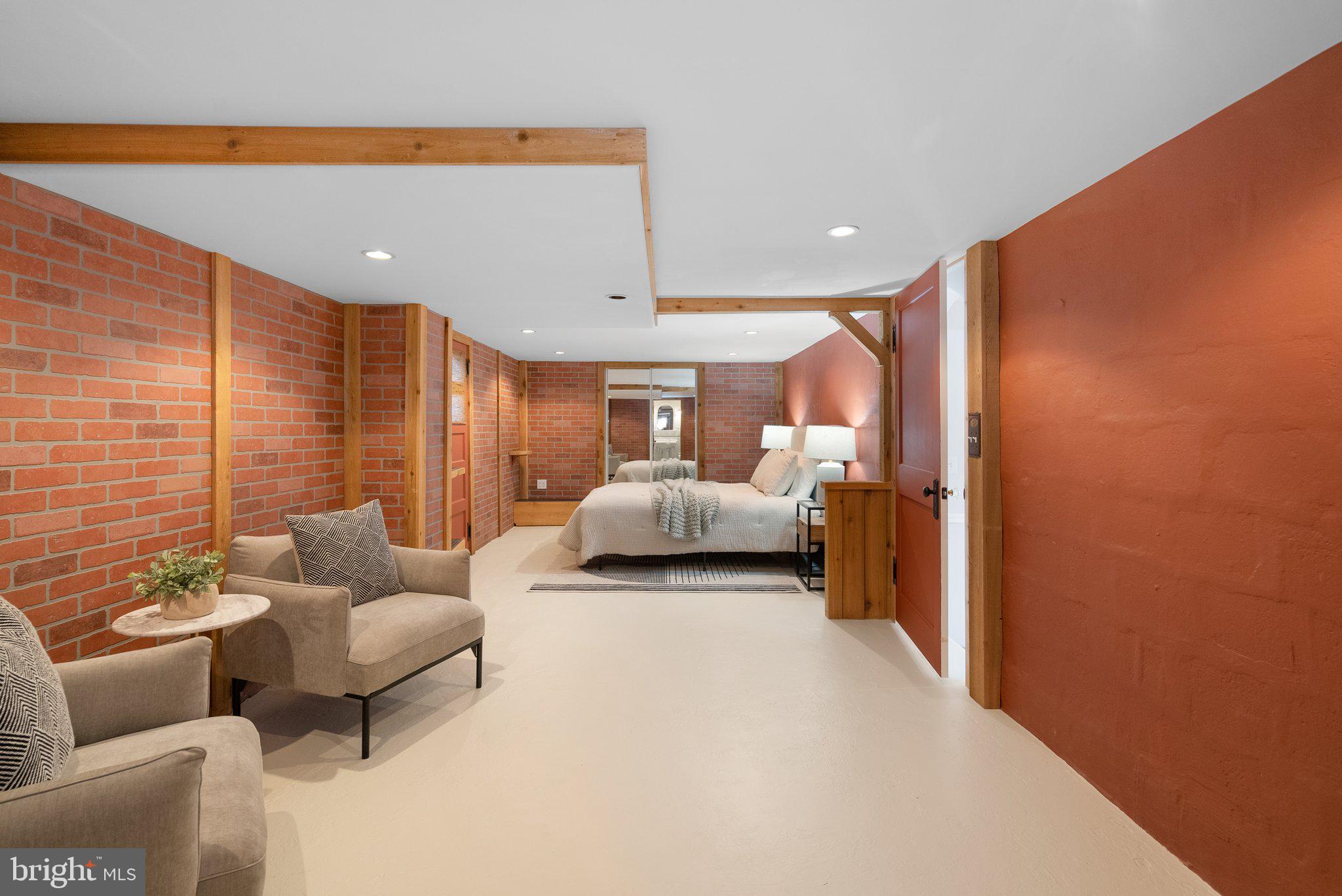 10210 Pierce Drive Silver Spring, MD 20901 - Photo 38 of 49 a bedroom with furniture and a large window